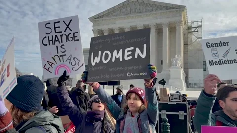 Protest at US Supreme Court after it was inclined to uphold hormone ban on trans Stock Footage 294650341