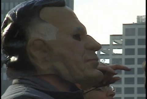 Protester in Mask at WTO Protests Stock Footage 106852964