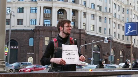 Protester with poster at anti-corruption protests, Tverskaya street. Stock Footage 74128235