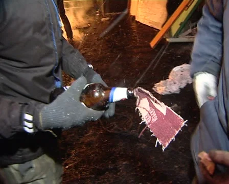 Protester throws a Molotov cocktail Stock Footage 69098549