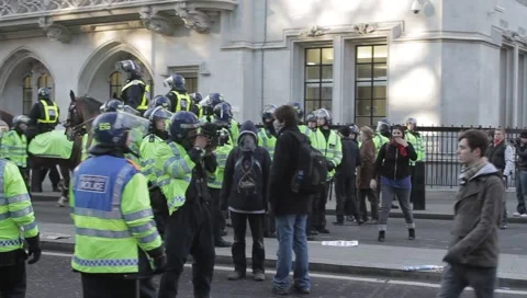 Protester tries to leave Stock Footage 3944784
