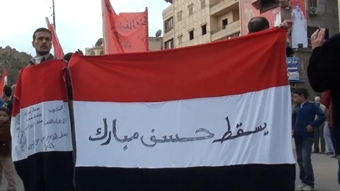 Protesters from all backgrounds gather in Tahrir Square Stock Footage 114838862