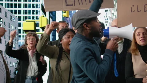 Protesters and demonstrators gather in a large environmental rally Stock Footage 325820089