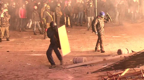 Protesters attacked police, throwing stones, set cars alight Stock Footage 35190899
