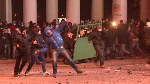 Protesters attacked police, throwing stones, set cars alight Stock Footage