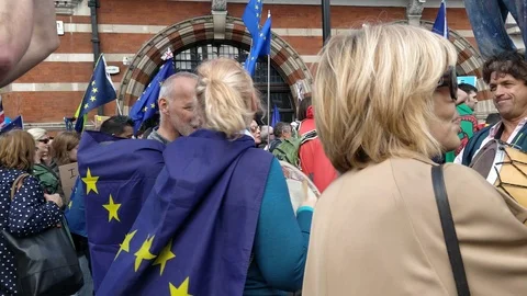 Protesters banging drums during march against Brexit Stock Footage 118276541