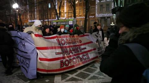 Protesters with banner: "To remember means to fight" Stock Footage 30462507