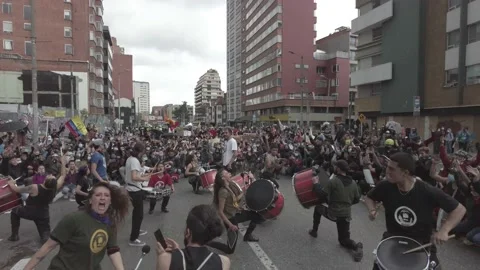Protesters on a Batucada with drums during the Colombian National Strike protest Stock Footage 153620891