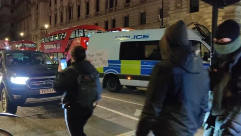 PROTESTERS BLOCK STREETS AT SARAH EVERARD RALLY IN LONDON UK 4K Stock Footage 150397730
