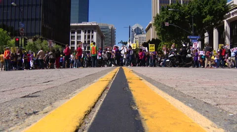 Protesters blocking street $15 per hr minimum wage crowd Stock Footage 62071715