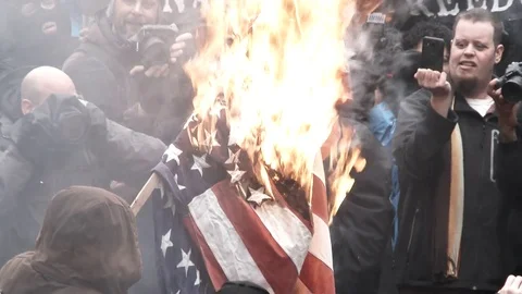 Protesters Burning The American Flag Stock Footage