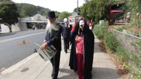 PROTESTERS CARRY COFFIN MARKED:  "RIP Democracy"  TECOMA AUSTRALIA (2013) Stock Footage 160178439