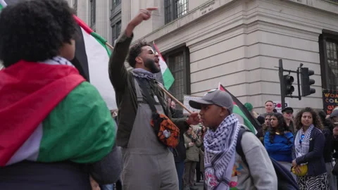 Protesters Chant Anti-war Slogans at London Demonstration Against War in Gaza Stock Footage 272775079