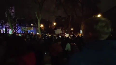 PROTESTERS CHANT 'WE ARE NOT AFRAID' AND 'HOW MANY MORE' UK 4K Stock Footage 150398400