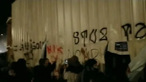 Protesters clash with police at Paris protest against police violence, France Stock Footage 170345184