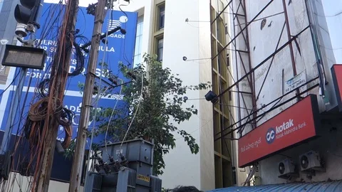 Protesters climb hoarding india Stock Footage 98434547