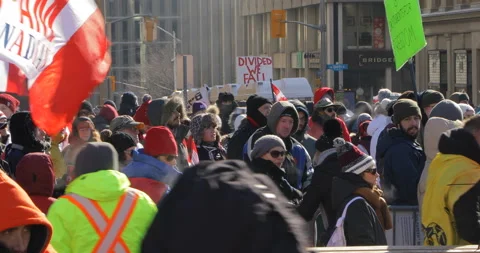 Protesters in crowd with flags Ottawa Parliament Hill crowds Stock-Footage 170340727