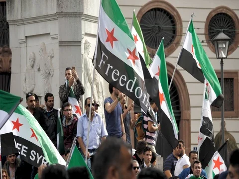 Protesters demonstrate in support of Syrian Rebels in Frankfurt Germany Stock Footage 79711025