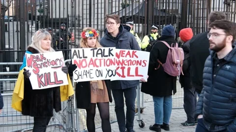 Protesters at Downing Street at Protest against Putin Invasion of Ukraine, UK Stock Footage 171141877