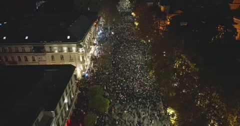 Protesters escaping. Georgia EU protests erupt. Tbilisi,Georgia streets. Stock Footage 294431434
