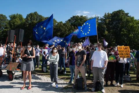 Protesters with EU Flags at Climate Protest in Munich, Germany Foto stock