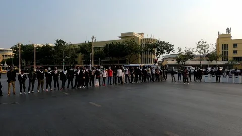 Protesters form a Long Human Wall during an Anti-Government Rally Stock Footage