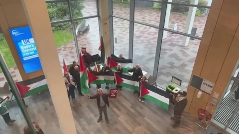 Protesters gather outside Anas Sarwar speech room as he sets out ambitions for  Stock Footage 316058209