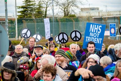 Protesters gather outside the main gate to the AWE, Aldermaston UK Stock Photos