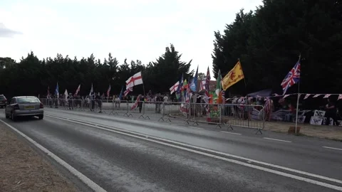 Protesters gather outside RAF Barnham protest near Thetford, Barnham, Suffolk Stock Footage 346450424