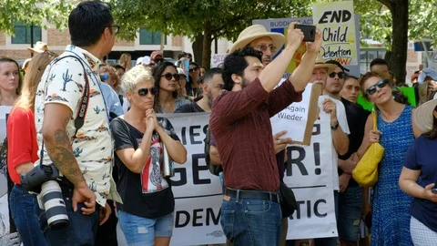 Protesters gathered in Austin Texas to protest against USA border camps Stock Footage 111717262