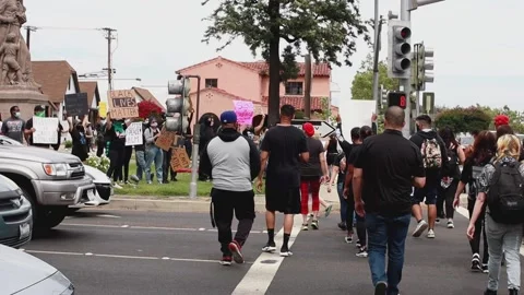 Protesters gathering, street view Stock Footage 131788704