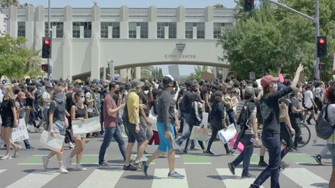 Protesters going down the street, BLM, Beverly Hills, California, June 6 2020 Stock Footage 136755688