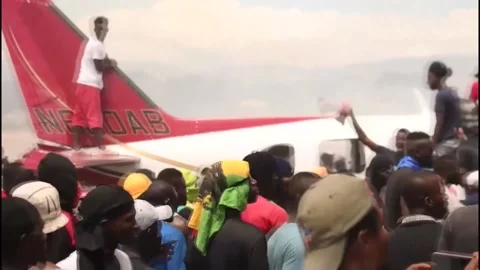 Protesters in Haiti cause damage at Les Cayes airport, HAITÍ, HT - 29 Mar 2022 Stock Footage 204117586