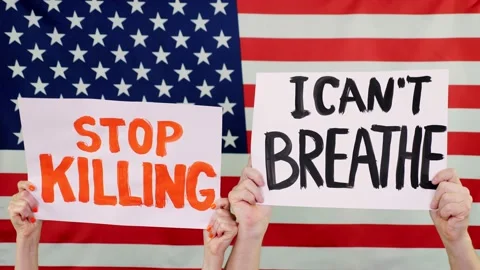 Protesters hold banners with slogans - Stop killing. I Cant Breathe - against Stock Footage 132002342