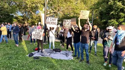 Protesters hold posters during Black Lives Matter protest on June 1, 2020 Stock Photos