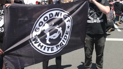 Protesters hold sign in front of courthouse during a black lives matter rally Stock Footage 131687464