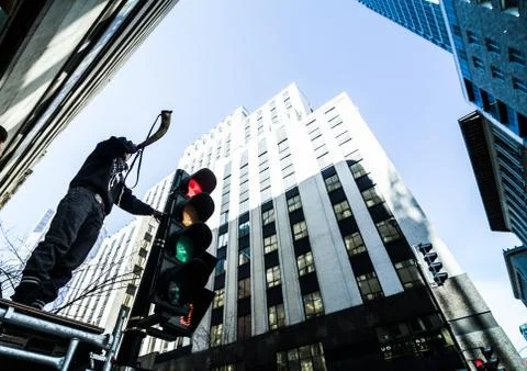 Protesters With Horn on top of Structure Plays a War Cry. Stock Photos