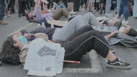 Protesters Laying on Road, Blocking London Street for Black Lives Matter Protest Stock Footage 131775366