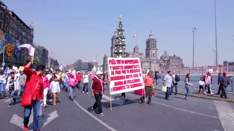 Protesters march and shout slogans against a planned rise in fuel prices. Stock Footage 78211614