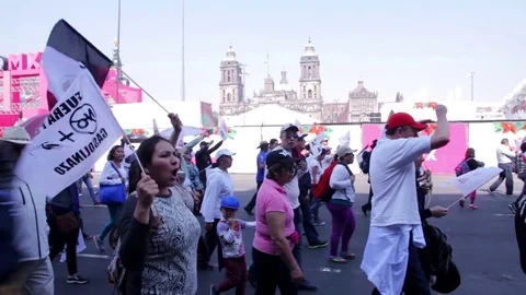 Protesters march and shout slogans against a planned rise in fuel prices. Stock Footage 78214475