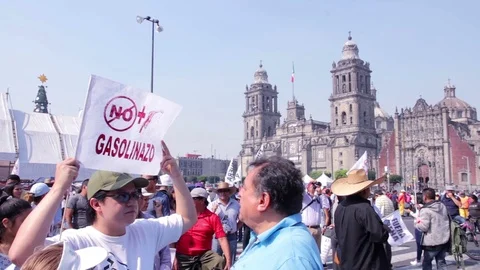 Protesters march and shout slogans against a planned rise in fuel prices. Stock Footage 78215952