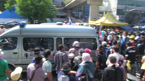 PROTESTERS MARCH UPRISING CROWD DEMONSTRATION EVACUATE AMBULANCE Stock Footage 38039020