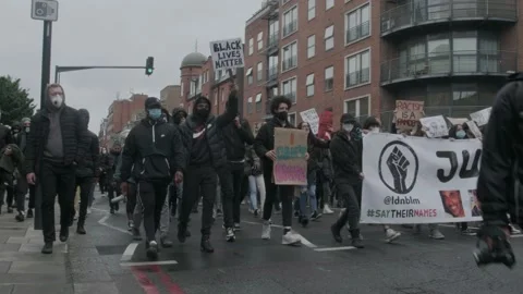 Protesters marching through London Streets for Black Lives Matter Protest London Stock Footage 132107198