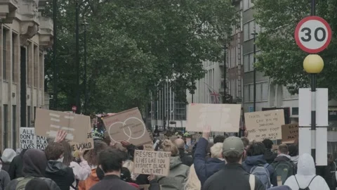 Protesters marching through London Streets for Black Lives Matter Protest Stock Footage 132107356