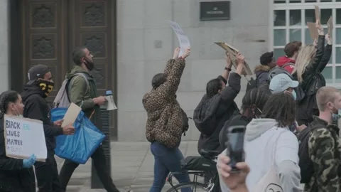 Protesters marching through London Streets, chanting "I Can't Breathe" Protest Stock Footage 132107390