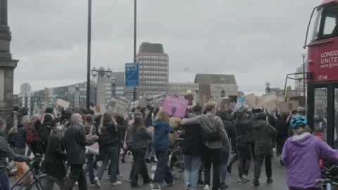 Protesters marching through London Streets for Black Lives Matter Protest Stock Footage 132107463