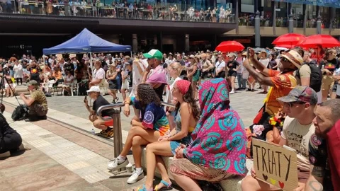 PROTESTERS IN PERTH GATHER TO SUPPORT INDIGENOUS COMMUNITY INVASION DAY RALLY 4K Stock Footage 231369112