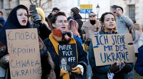 Protesters with Placards Chanting at Protest against Russian invasion of Ukraine Stock Photos