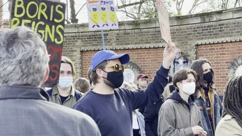PROTESTERS WITH PLACARDS AT KILL THE BILL PROTEST ON EASTER WEEKEND 2021 UK 4K Stock Footage 151543219