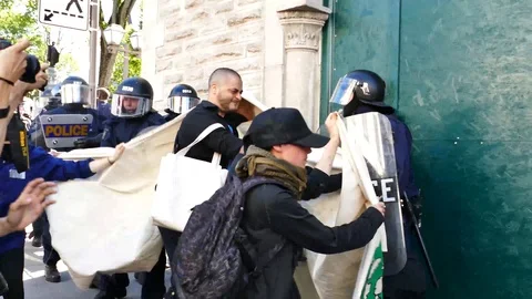 Protesters pushing police Stock Footage 95268059